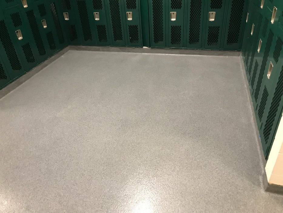 Nipmuc High School locker room double broadcast epoxy floor in Upton, MA.