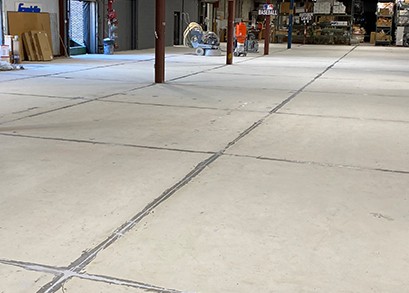 concrete floor prep in progress by Boston Concrete